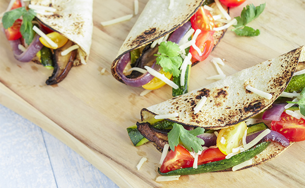 Soft tacos with refried beans (V)